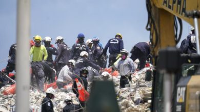 Crews spend 5th day atop shaky pile of collapsed concrete