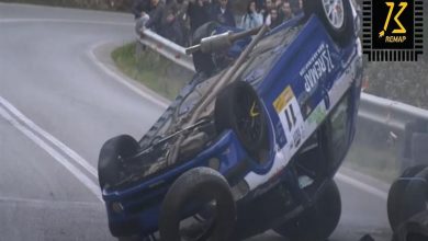 A racing car overturned on the Ascent of Dionysos